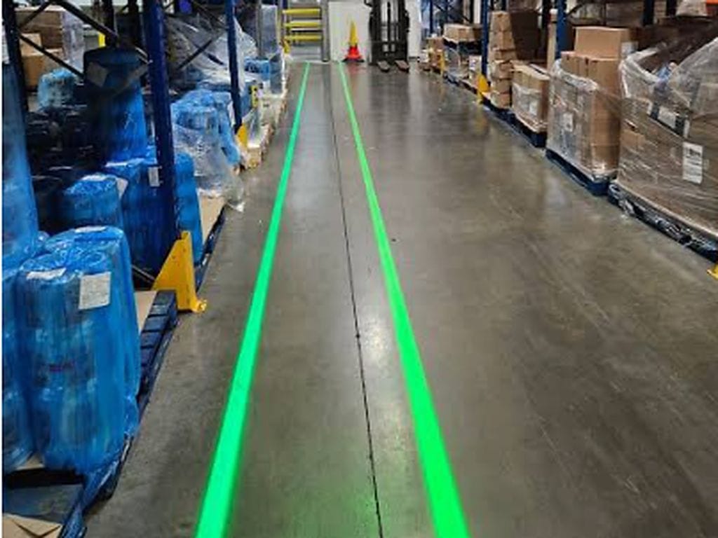 How a laser line projector keeps warehouse safety lines visible in bright forklift areas