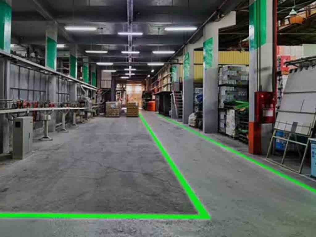 Forklift boundary marking with laser line projector in warehouse