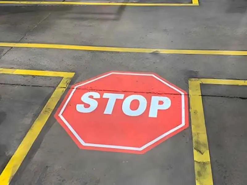 Why Stop Sign Projector Better Warehouse Safety Than Faded Floor Paint